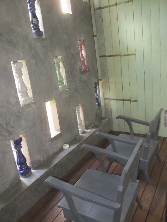 The only space that left us wondering. A porch is a nice thought, but one half enclosed with concrete?