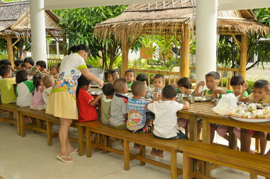 Meals are taken communally at the village's central courtyard.