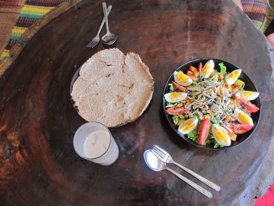 A superfood salad, homemade flat bread, and iced chai masala.