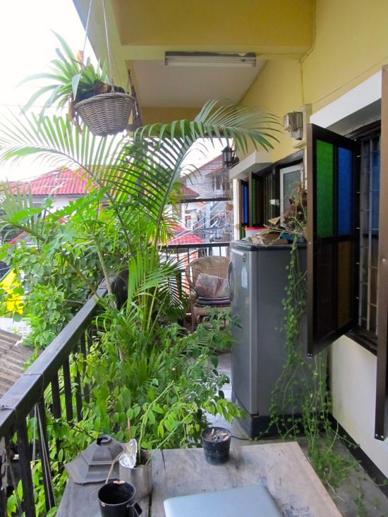 A nicer, greener room with a balcony on the second floor.