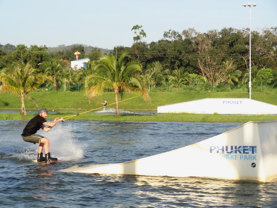 A board rider readies himself for an obstacle jump.