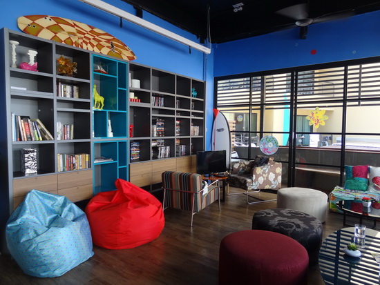 Cheerful living area with a hip surfer's vibe.