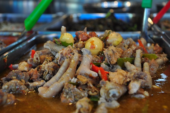 Isaan style chicken feet soup.