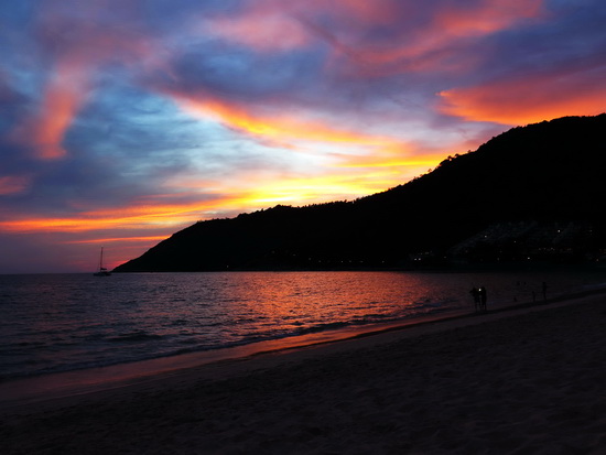 Nai Harn sunset. Soft landing at the end of a day's drive.