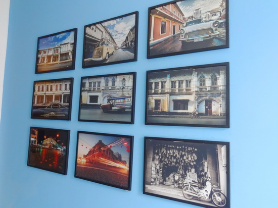 Vintage photos at The Rommanne guesthouse capture the Old Town spirit.