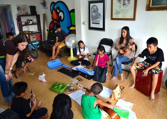 Gigi and Amm at work with the youngsters.