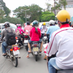 All the cool drivers in Saigon wear helmets.