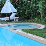All tropical landscaped gardens and a jacuzzi!
