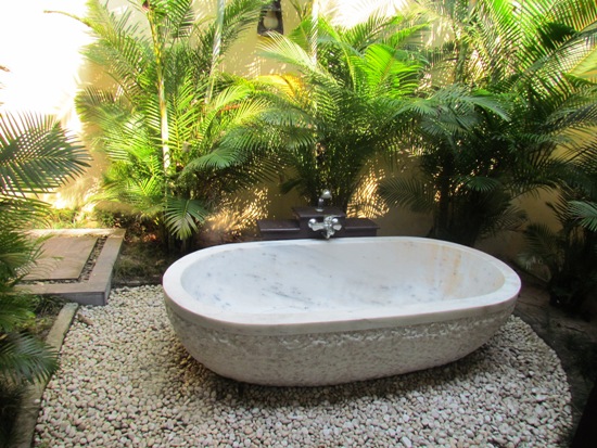 Outdoor marble bathtub.