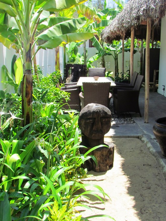 Shaded tropical garden entertaining.