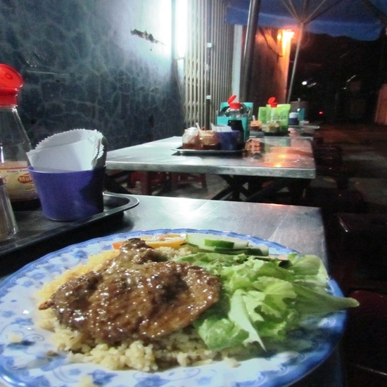 Alley eats; pork and rice.