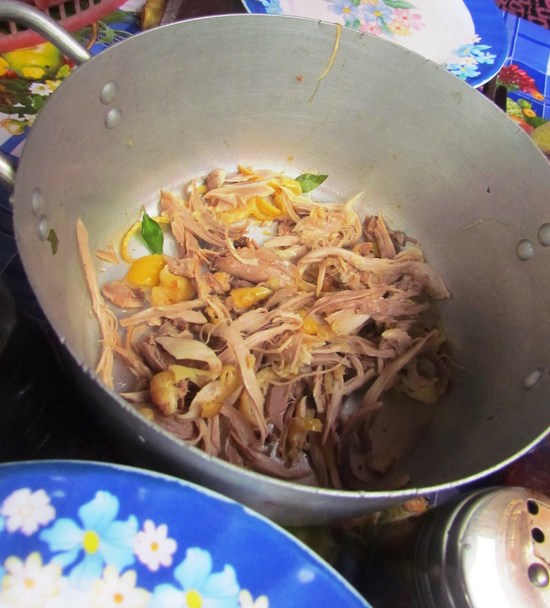 The shredded chicken bits.