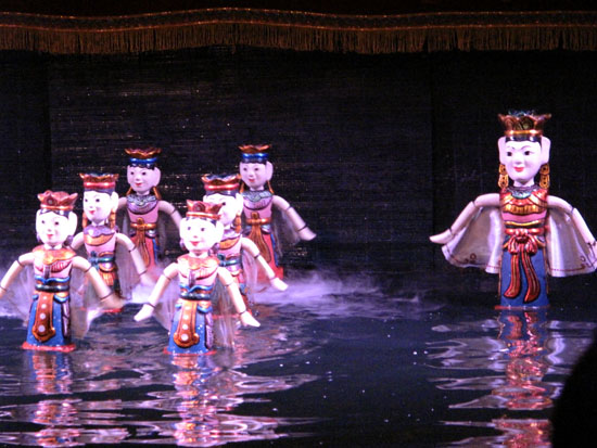 Seven of the eight fairies dance.