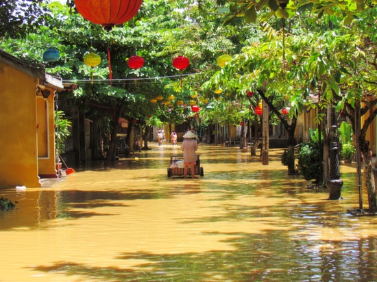 Even heavy flooding can't ruin a photo in Hoi An.