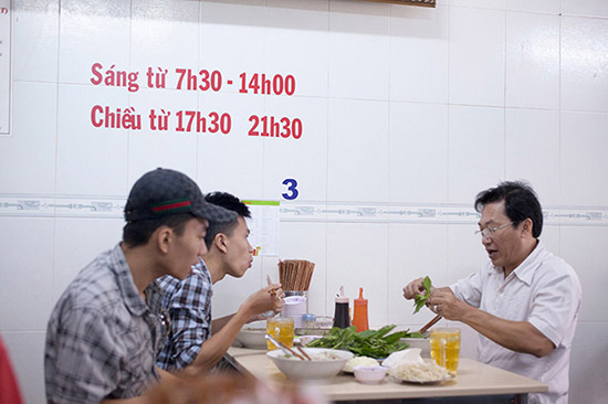 Tucking in at Pho Hoa.