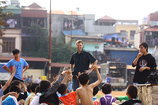 Blue Dragon Michael addressing football kids